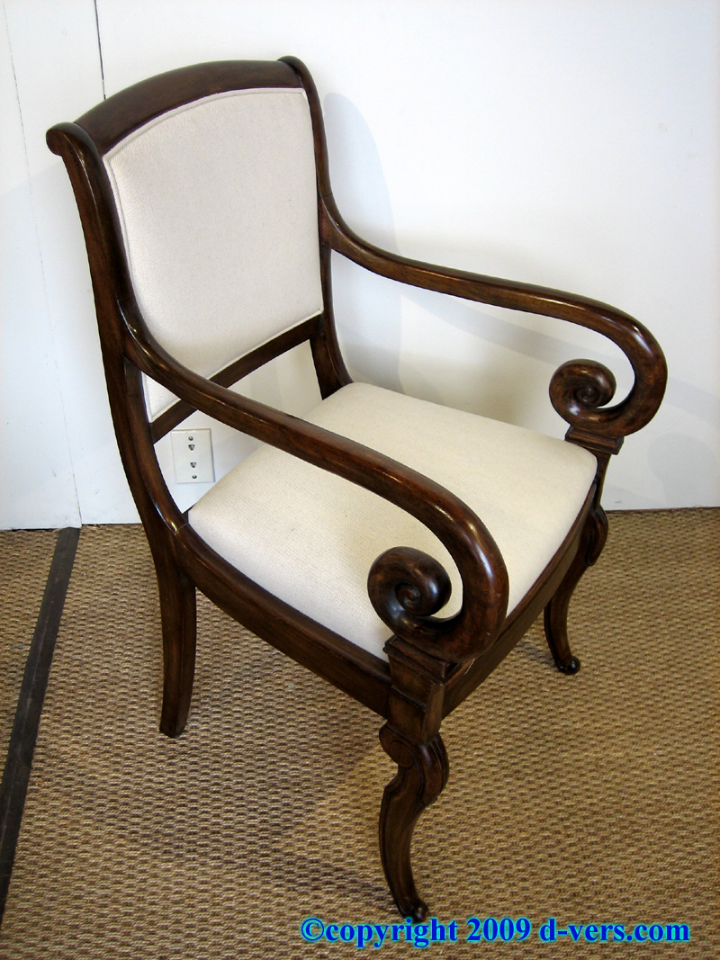 Pair of Charles X Scrolling Arm Chairs in Mahogany 