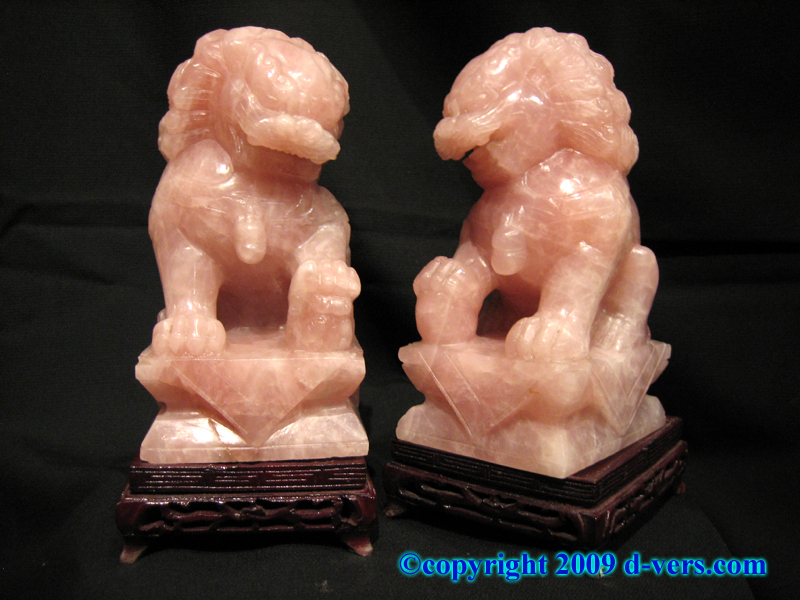 Chinese pair of carved rose quartz foo dog statues 